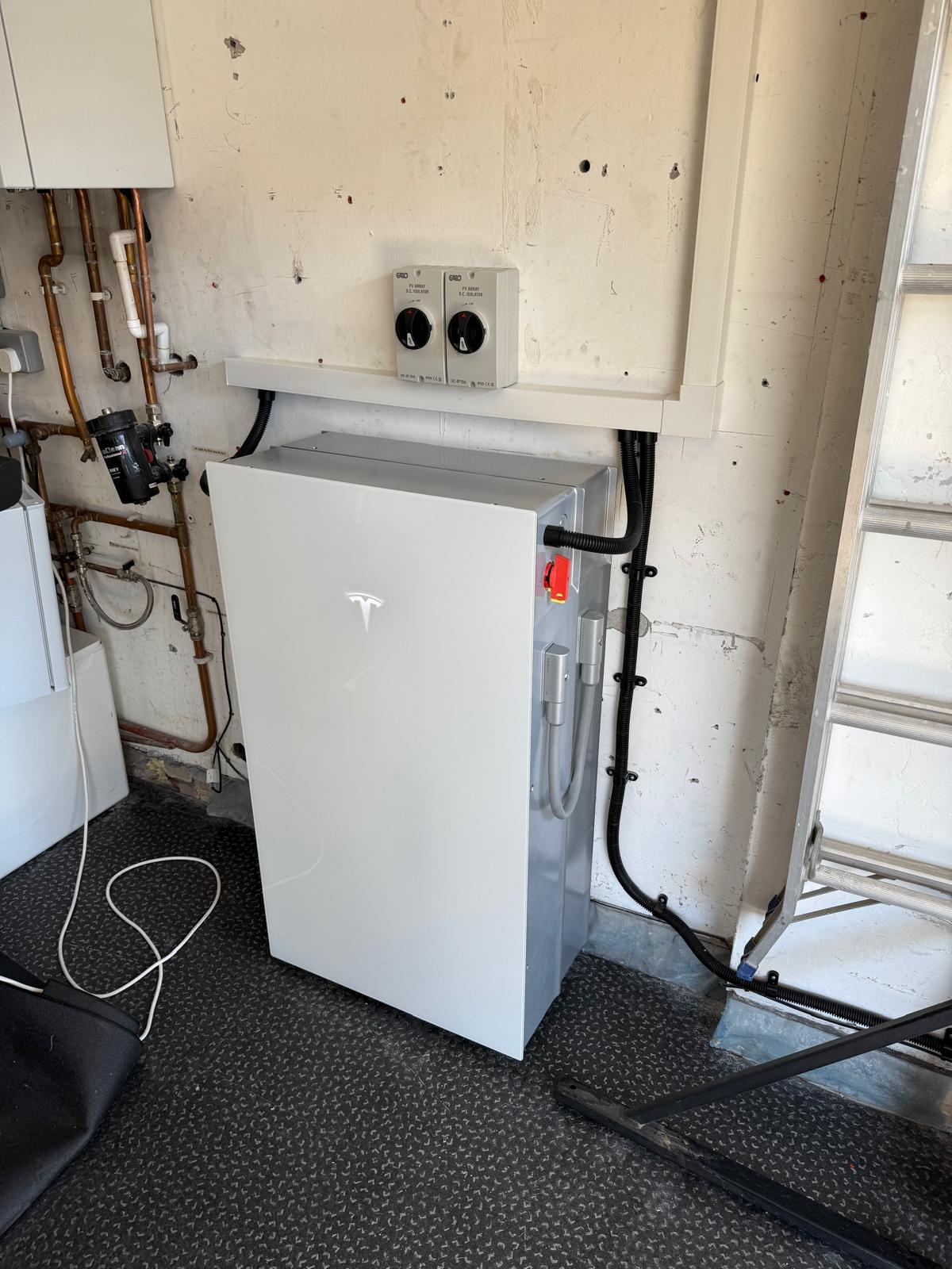 Tesla Powerwall battery system installed by WH Renewables