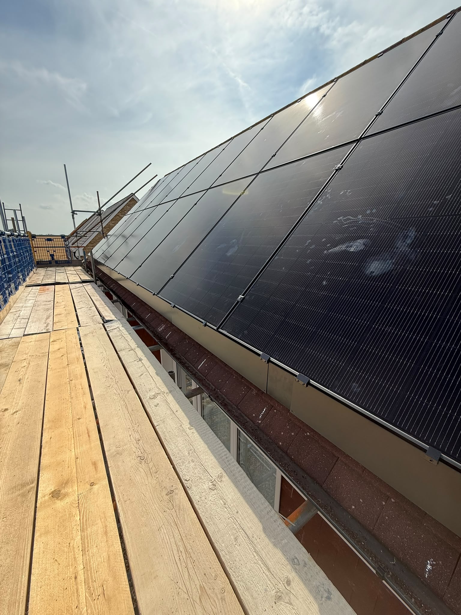 Close view of a neatly finished solar panel array